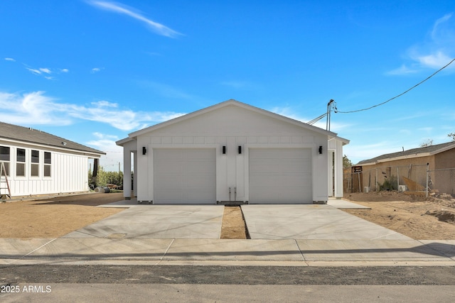 garage featuring fence