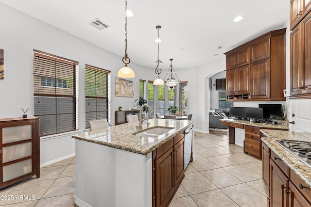 9285 E Canyon Vw, Scottsdale, AZ 85255 - kitchen with recessed lighting, visible vents, a sink, light tile patterned flooring, and arched walkways
