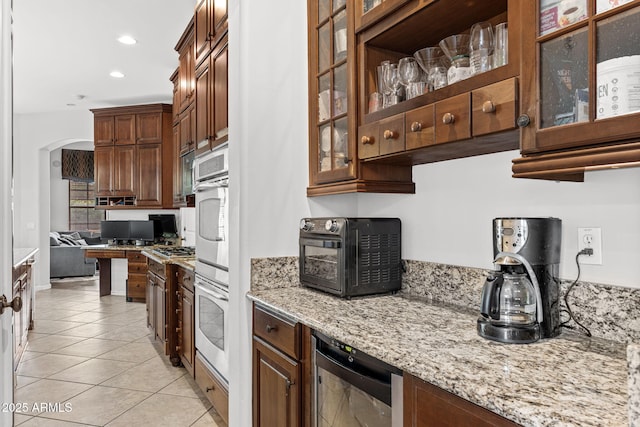 9285 E Canyon Vw, Scottsdale, AZ 85255 - kitchen featuring a toaster, recessed lighting, light stone countertops, beverage cooler, and light tile patterned floors