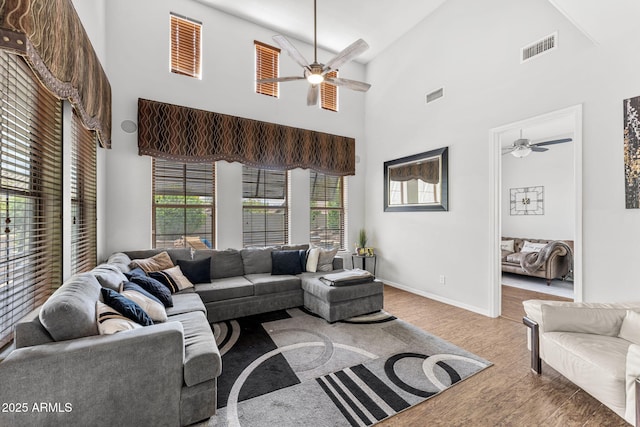 9285 E Canyon Vw, Scottsdale, AZ 85255 - living room featuring high vaulted ceiling, ceiling fan, visible vents, and plenty of natural light