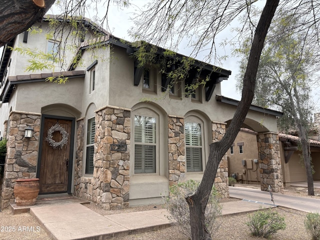 9285 E Canyon Vw, Scottsdale, AZ 85255 - view of front of home featuring stucco siding and stone siding