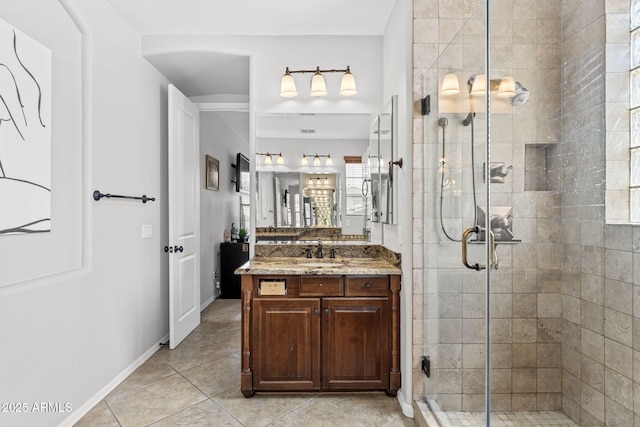 9285 E Canyon Vw, Scottsdale, AZ 85255 - bathroom featuring tile patterned floors, baseboards, vanity, and a stall shower