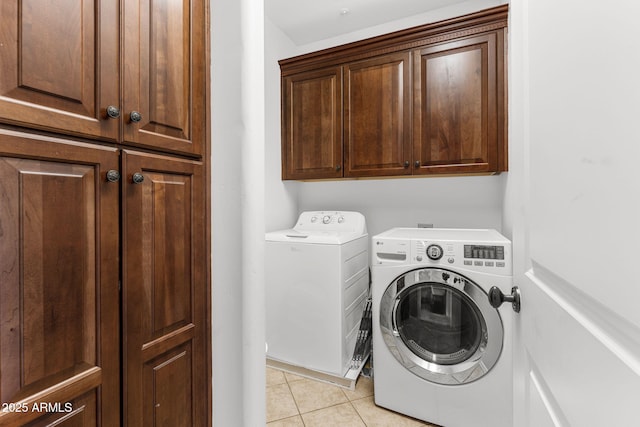 9285 E Canyon Vw, Scottsdale, AZ 85255 - clothes washing area with washer and dryer, cabinet space, and light tile patterned floors