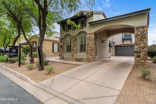 9285 E Canyon Vw, Scottsdale, AZ 85255 - mediterranean / spanish-style home featuring stucco siding, stone siding, and concrete driveway