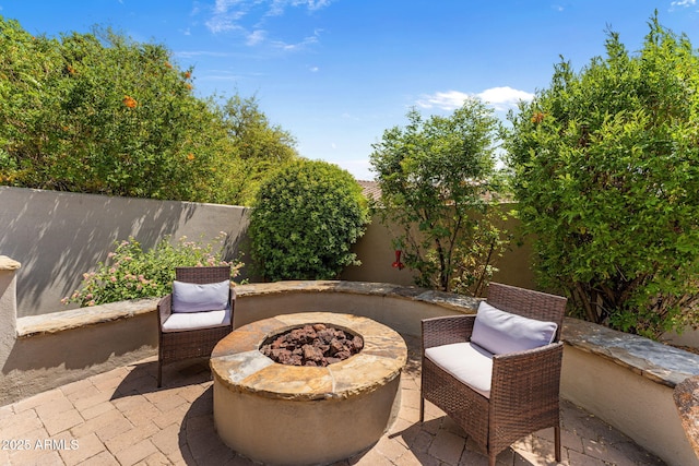 9285 E Canyon Vw, Scottsdale, AZ 85255 - view of patio / terrace with a fenced backyard and an outdoor fire pit