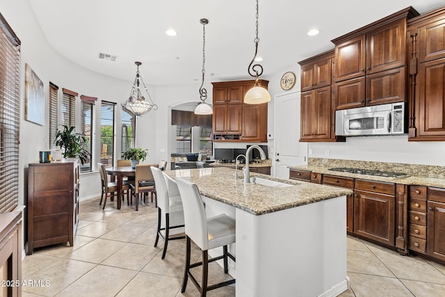 9285 E Canyon Vw, Scottsdale, AZ 85255 - kitchen featuring a sink, light tile patterned floors, appliances with stainless steel finishes, visible vents, and recessed lighting
