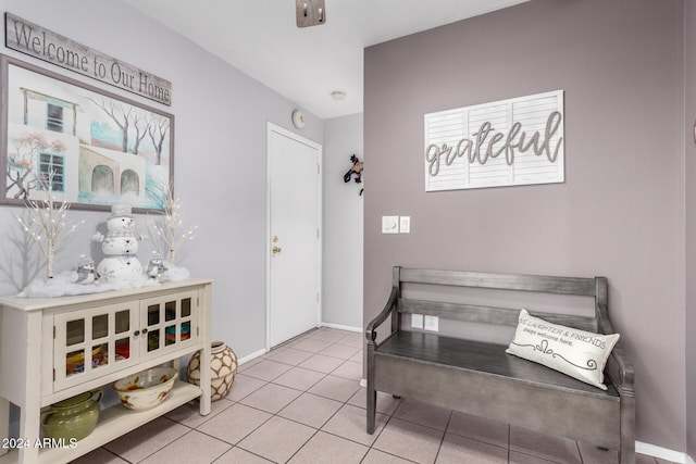 bedroom with light tile patterned flooring