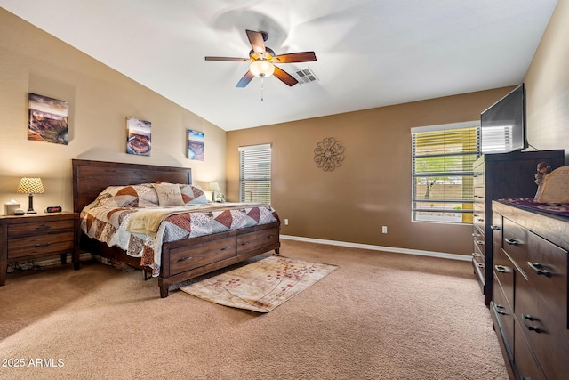 bedroom featuring visible vents, baseboards, light colored carpet, vaulted ceiling, and a ceiling fan