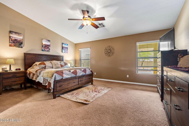 bedroom featuring visible vents, baseboards, light colored carpet, vaulted ceiling, and a ceiling fan