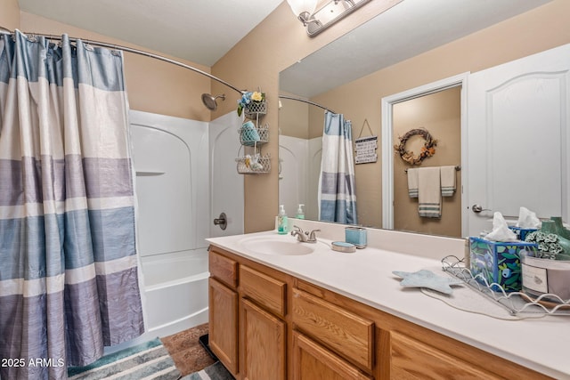 bathroom featuring vanity and shower / bath combo