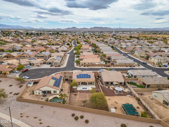 drone / aerial view with a residential view and a mountain view