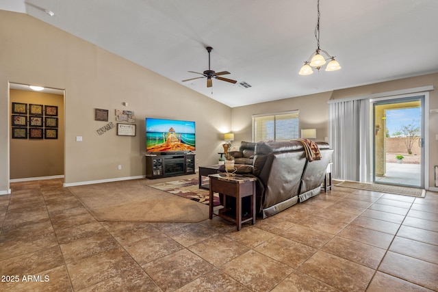 living room with baseboards, high vaulted ceiling, ceiling fan, and tile patterned flooring