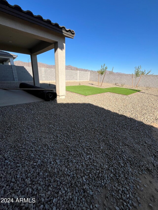 view of yard with a patio and a fenced backyard