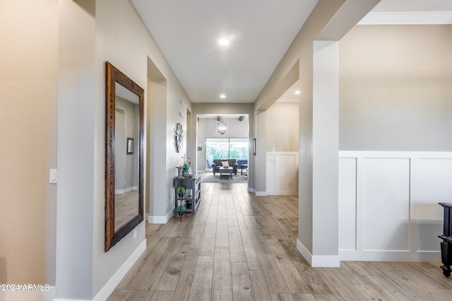 corridor featuring light hardwood / wood-style floors