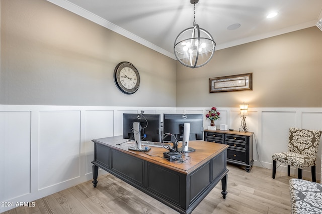 office featuring light hardwood / wood-style floors, ornamental molding, and a chandelier