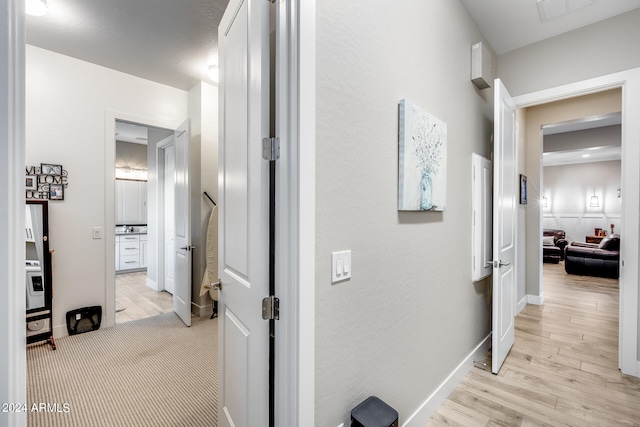 hall featuring light hardwood / wood-style floors