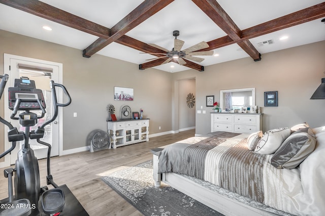 bedroom featuring beam ceiling, light hardwood / wood-style floors, ceiling fan, and coffered ceiling