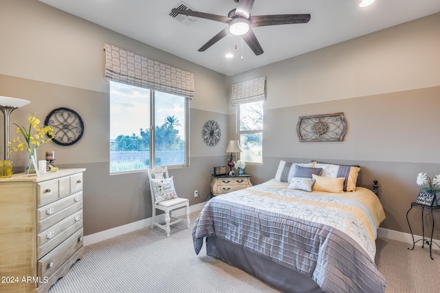 carpeted bedroom with ceiling fan