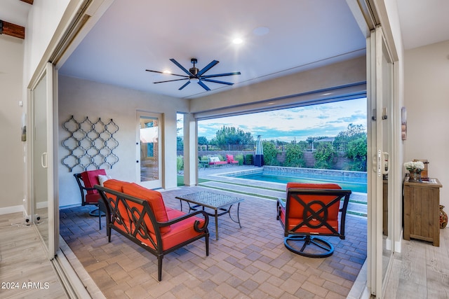 view of patio featuring ceiling fan