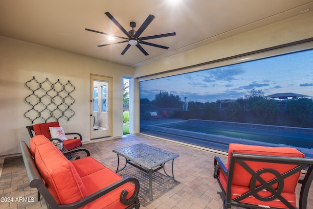 interior space featuring ceiling fan