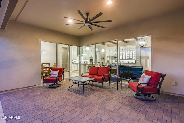 view of patio / terrace with ceiling fan and outdoor lounge area