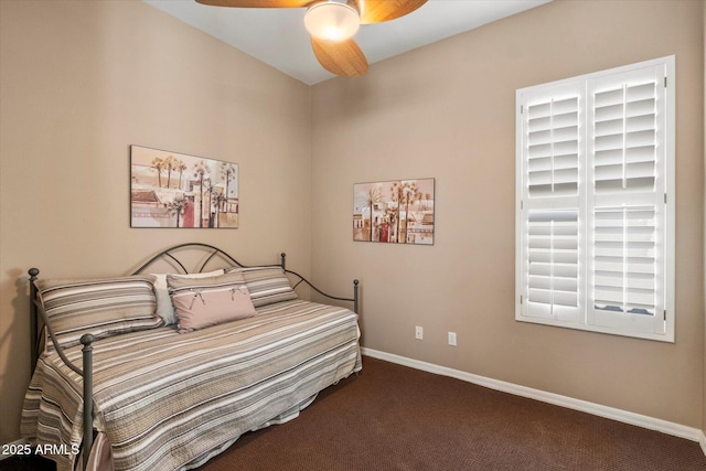 7291 E Eagle Feather Rd, Scottsdale, AZ 85266 - carpeted bedroom with baseboards and ceiling fan