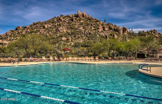 7291 E Eagle Feather Rd, Scottsdale, AZ 85266 - community pool featuring a patio area