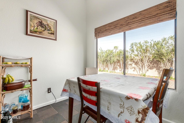 dining space with baseboards