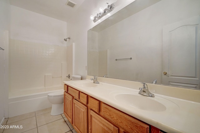 full bathroom with oversized vanity, toilet, tile flooring, shower / bathing tub combination, and double sink