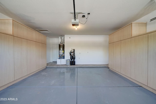 garage featuring water heater