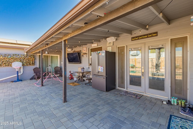 view of patio / terrace featuring french doors