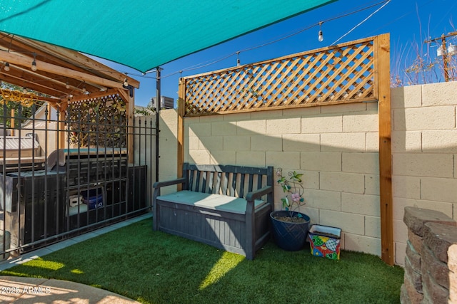 view of yard with a fenced backyard