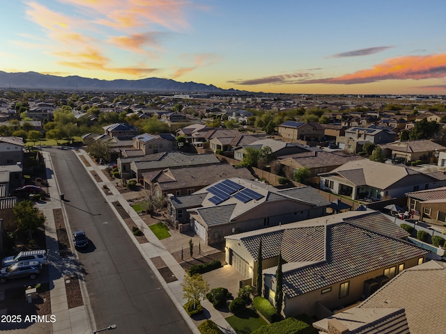 aerial view with a mountain view and a residential view