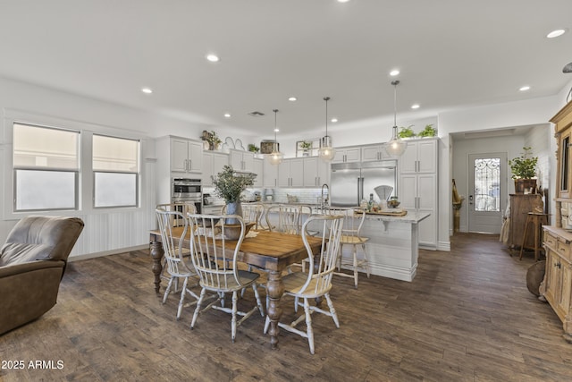 dining area with visible vents, recessed lighting, and dark wood-type flooring