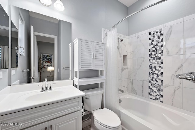 full bath with vanity, shower / tub combo, and toilet