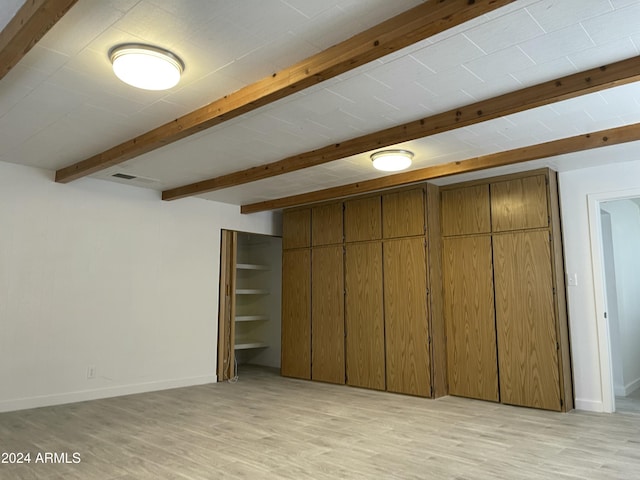 basement with light wood-type flooring