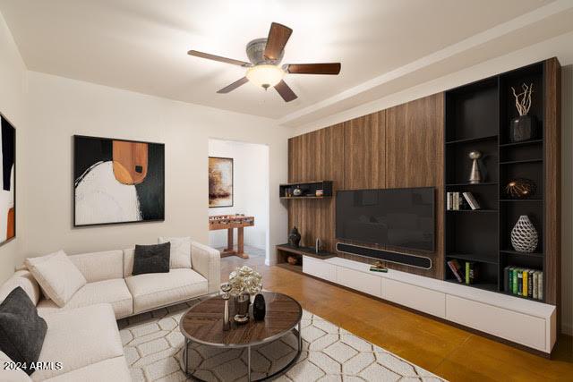 living room with ceiling fan