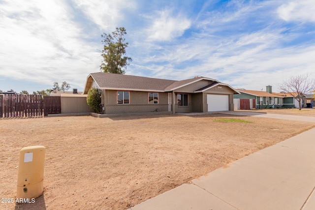 ranch-style house featuring a garage