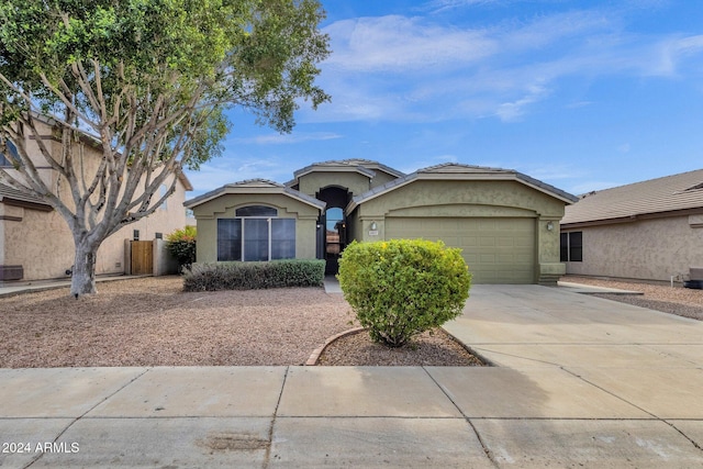 view of front of home featuring a garage