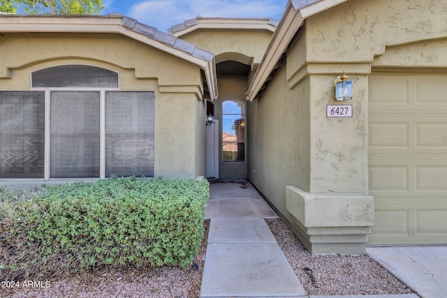 entrance to property with a garage