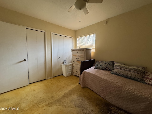 831 S Calle Virada, Sierra Vista, AZ 85635 - bedroom with multiple closets, light colored carpet, and a ceiling fan