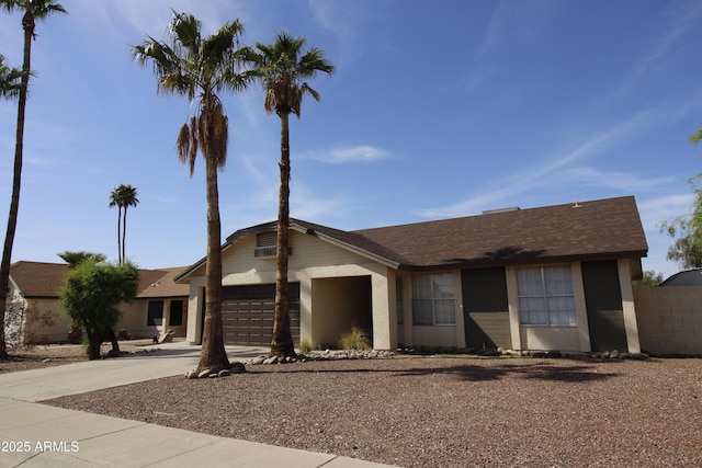 702 W Sequoia Dr, Phoenix, AZ 85027 - view of front of home with concrete driveway and a garage