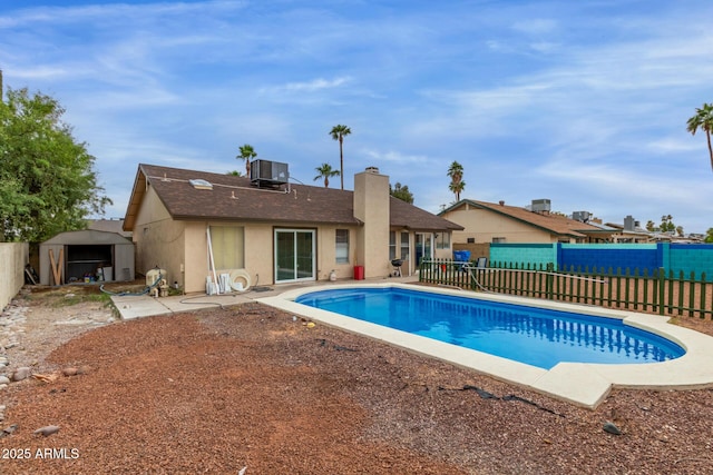 702 W Sequoia Dr, Phoenix, AZ 85027 - view of swimming pool with a storage shed, a fenced backyard, and a patio area