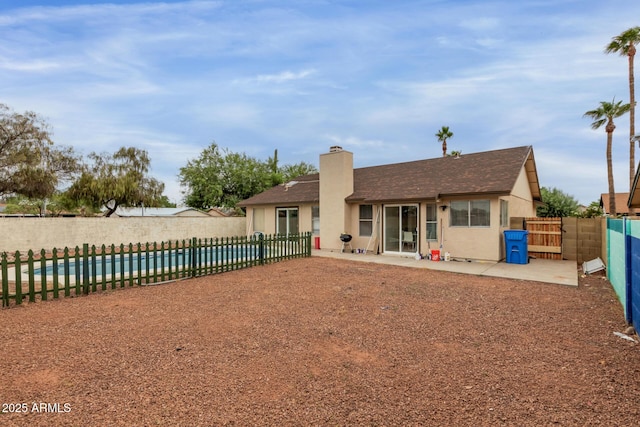 702 W Sequoia Dr, Phoenix, AZ 85027 - back of house featuring a swimming pool, roof with shingles, a patio area, and stucco siding