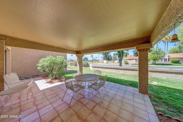 view of patio with outdoor dining area