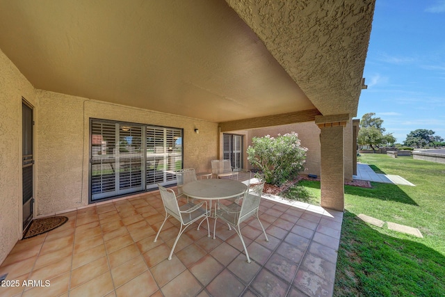 view of patio featuring outdoor dining space