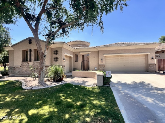 3225 E Cardinal Ct, Chandler, AZ 85286 - view of front of property with a garage, stucco siding, and stone siding