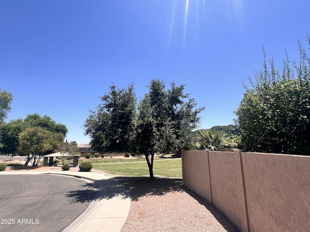 3225 E Cardinal Ct, Chandler, AZ 85286 - view of asphalt road featuring sidewalks and curbs