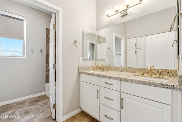 27420 N 170th St, Rio Verde, AZ 85263 - full bathroom with double vanity,  shower combination, baseboards, and a sink