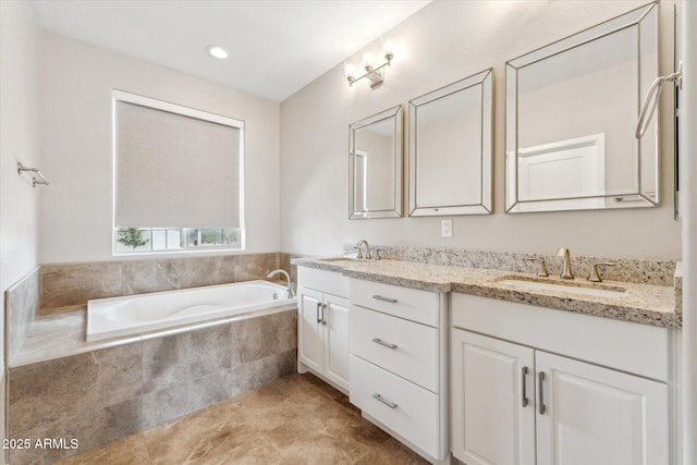 27420 N 170th St, Rio Verde, AZ 85263 - bathroom featuring a garden tub, double vanity, a sink, and tile patterned flooring